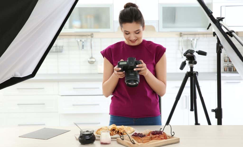 Woman taking photo of food